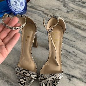 Snakeskin print heels